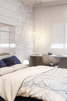 Λευκή και γκρι κρεβατοκάμαρα με χώρο εργασίας