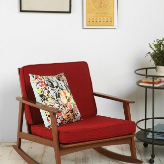 Καφέ και κόκκινη κουνιστή καρέκλα