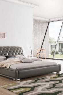 Γκρι δερμάτινο κρεβάτι με καμπύλη κεφαλάρι