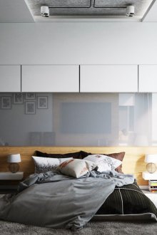 Ασπρόμαυρη κρεβατοκάμαρα με γκρι γυαλιστερό πλαίσιο