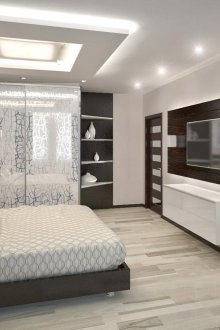 Γκρίζο κρεβάτι και λευκή τουαλέτα σε ένα υπνοδωμάτιο υψηλής τεχνολογίας