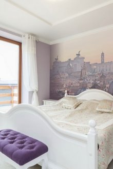 Τοιχογραφία με θέα στις στέγες της πόλης στην κρεβατοκάμαρα