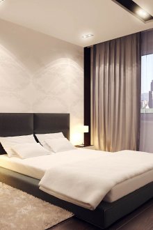 Μαύρο κρεβάτι μινιμαλισμού στο υπνοδωμάτιο