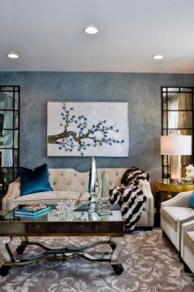 Μπεζ καναπέ και πολυθρόνες σε ένα σαλόνι διακόσμησης art deco