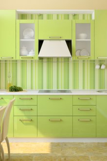 Πράσινο ακουστικό πρόσοψης στην κουζίνα