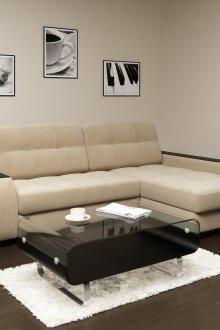 Μπεζ και μαύρο δερμάτινο καναπέ