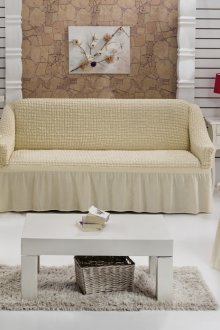 Κρέμα καλύπτει στον καναπέ και τις καρέκλες στο σαλόνι