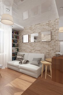 Καφέ-μπεζ ταπετσαρία κάτω από ένα τούβλο στο σαλόνι-κουζίνα