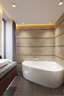 Κομψό μοντέρνο μπάνιο με γωνιακή μπανιέρα