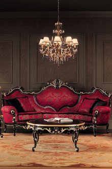 Μαύρο και κόκκινο κλασικό καναπέ στο σαλόνι