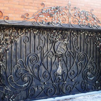 Συρόμενες πόρτες σφυρηλατημένες