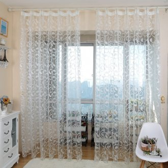 Ξύλινη δαντέλα στη διακόσμηση της πρόσοψης του σπιτιού