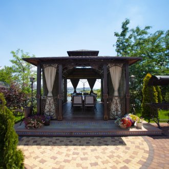 The design of the courtyard of the house with a gazebo