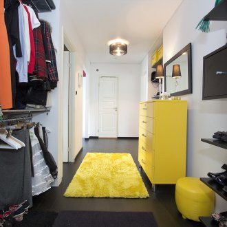 Narrow yellow chest of drawers in the interior