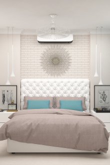 Λευκός τοίχος από τούβλα στο εσωτερικό ενός φωτεινού υπνοδωματίου