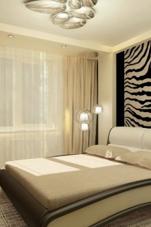 Ταπετσαρία με ζωική εκτύπωση και μπεζ ταπετσαρία στο εσωτερικό της κρεβατοκάμαρας