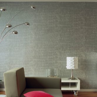 Γκρι ταπετσαρία κάτω από το δέρμα ενός κροκόδειλου