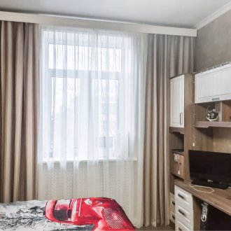 Cortines beige per a un noi
