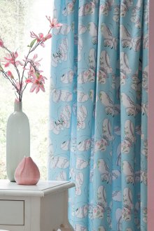 Blue curtains with butterflies