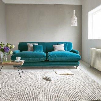 Turkos sammet soffa