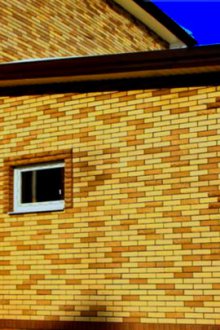 Κίτρινο σπίτι από τούβλα