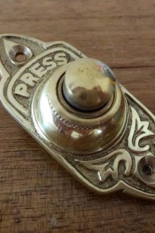 Κουδούνι με την επιγραφή