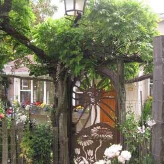 Metal arched gate