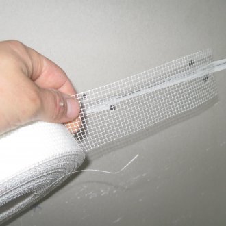 Plasterboard dempul dengan pita pengukuhan