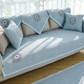 Κάλυψη με κέντημα στον καναπέ