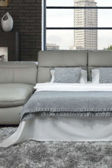 Γκρίζος δερμάτινος καναπές κρεβάτι