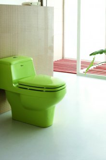 Grønnfarget toalett