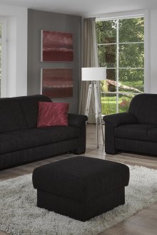 Δύο μαύροι καναπέδες και ένας οθωμανικός στο σαλόνι