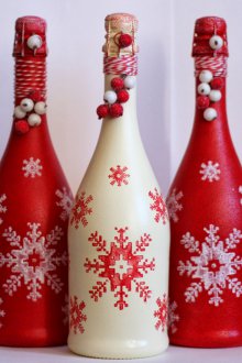 Δεσπόζης μπουκάλια σαμπάνιας για το νέο έτος με νιφάδες χιονιού