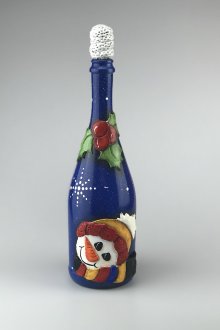 Πρωτοχρονιά διακόσμηση ενός μπουκαλιού από γυψομάρμαρο σαμπάνιας