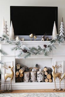 Διακόσμηση διαμερίσματος ενός δωματίου για το νέο έτος με κούτσουρα