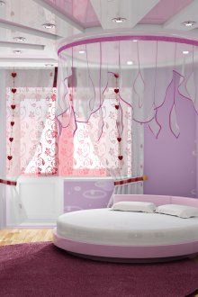 Όμορφη κρεβατοκάμαρα για το κορίτσι σε λιλά χρώματα