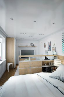 Υπνοδωμάτιο σε ένα διαμέρισμα στούντιο με έπιπλα