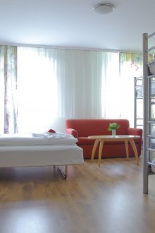 Υπνοδωμάτιο σε διαμέρισμα στούντιο για μια οικογένεια