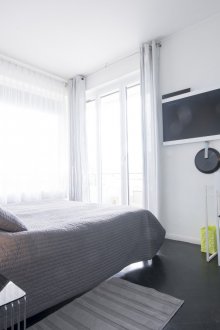 Piccola camera da letto con balcone