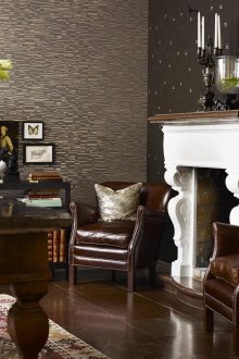 Συνδυάζοντας σκοτεινή γεωμετρική ταπετσαρία και κύκλους στο σαλόνι