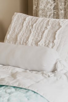 Μαξιλάρι μαξιλαριού στην κρεβατοκάμαρα