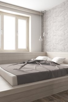 Κρεβάτι στο βάθρο του γκρι