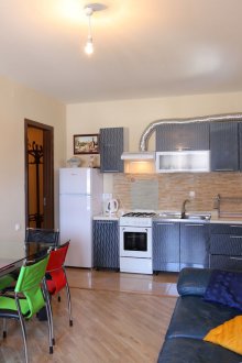 Σχεδιασμός καθιστικό κουζίνα σε ένα διαμέρισμα στούντιο