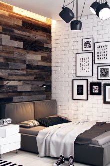 Ασπρόμαυρες ζωγραφιές σε έναν τοίχο από τούβλα σε μια κρεβατοκάμαρα