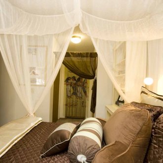 Διακόσμηση των εξόδων από τα δωμάτια σε αιγυπτιακό στυλ με ύφασμα